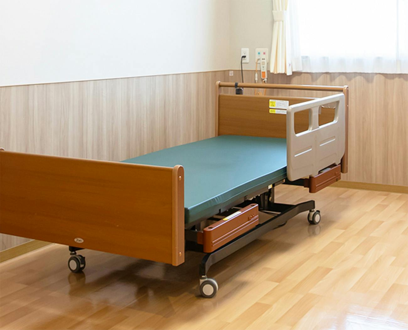 ケアハウス エバーグリーンみずほの ベッド